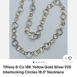 Tiffany & Co. Gold and Silver Interlocking Necklace only.